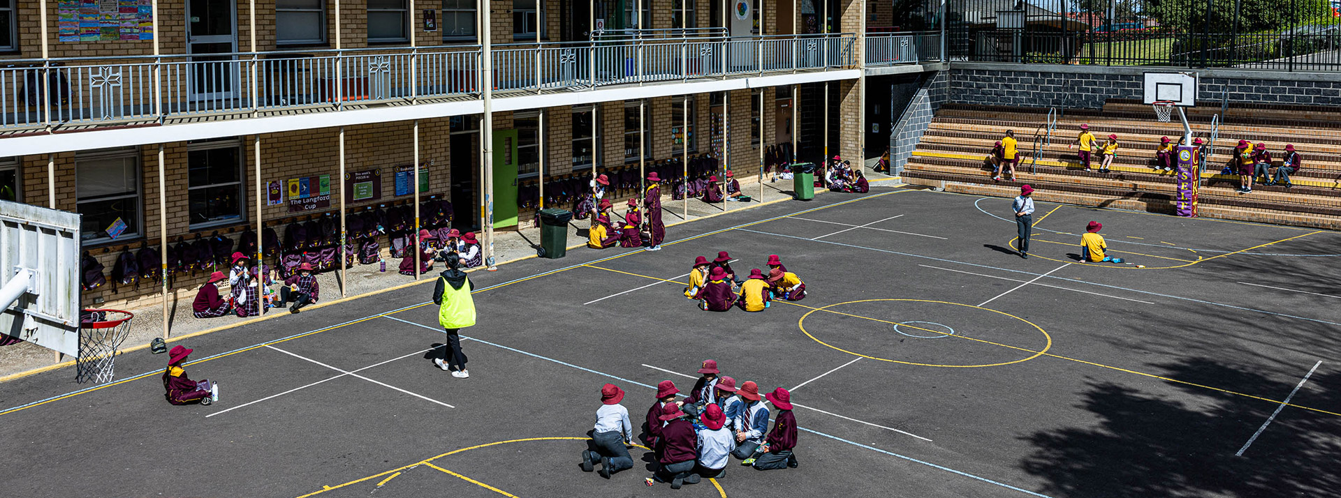 Teacher in the Christ the King Catholic Primary Nth Rocks playground