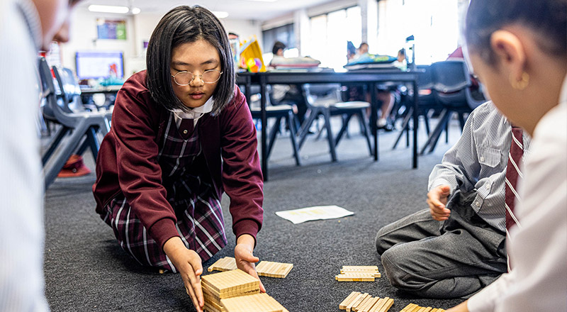 student using building blocks at Christ the King Catholic Primary School North Rocks