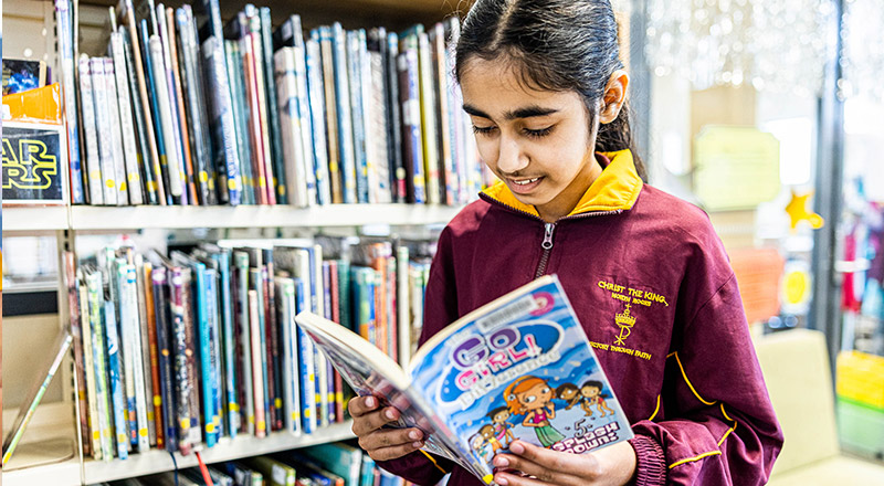 Student in library at Christ the King Catholic Primary School North Rocks
