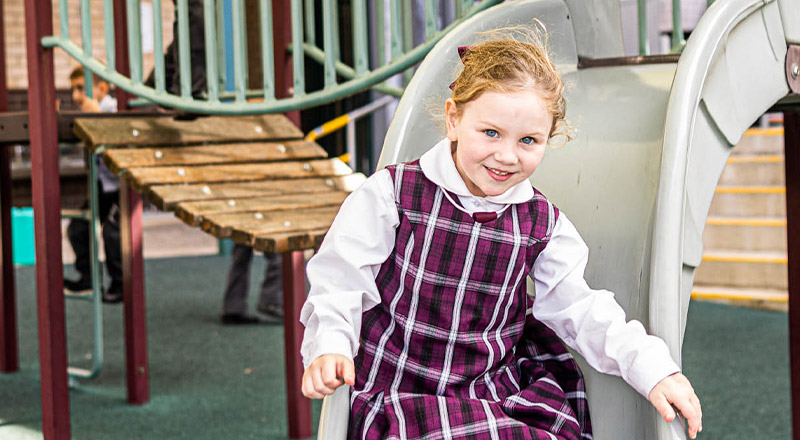 Student on slide at Christ the King Catholic Primary School North Rocks