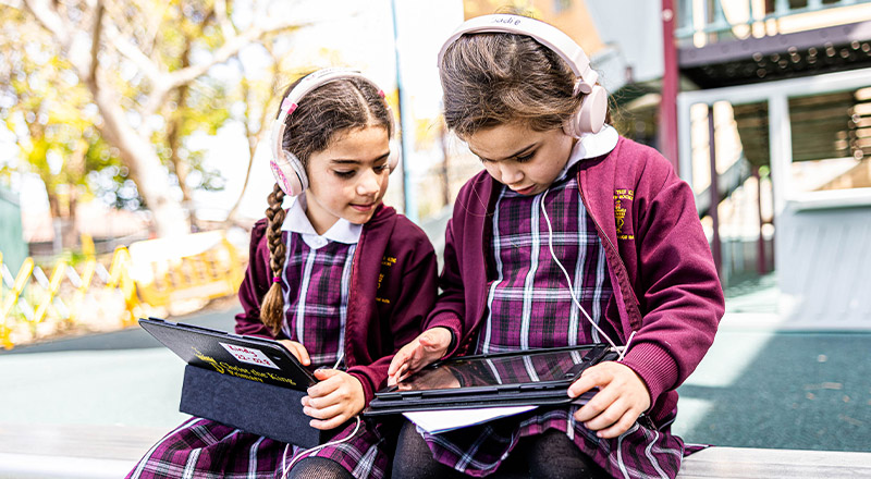 Students with headphones at Christ the King Catholic Primary School North Rocks