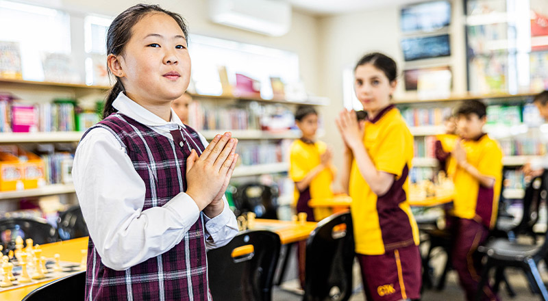 Student praying at Christ the King Catholic Primary School North Rocks