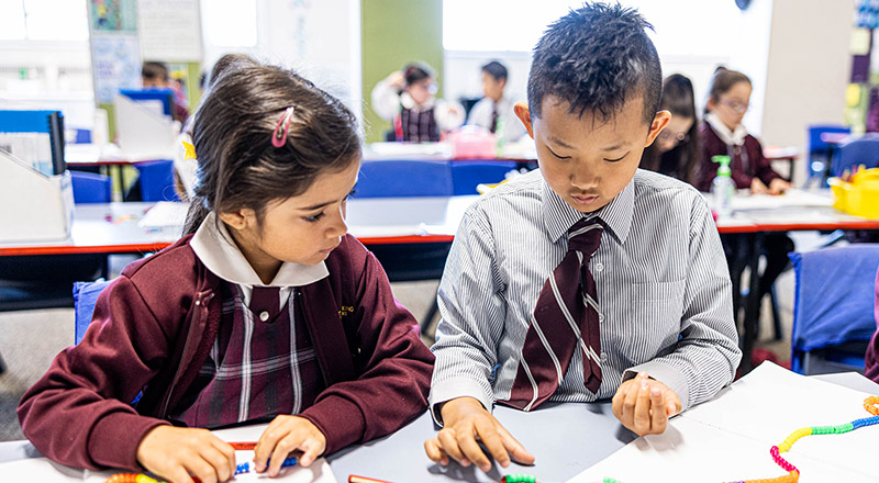 students interacting in classroom at Christ the King Catholic Primary School North Rocks